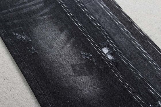 9.8oz θείο μαύρο σχηματισμό Slub denim ύφασμα 100% βαμβάκι desizing τζιν ύφασμα