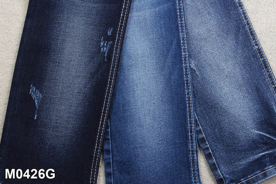 Καλή τιμή 10,3 OZ υψηλό Slub στρεβλώσεων τεντωμάτων ύφασμα τζιν για την παραγωγή τζιν σε απευθείας σύνδεση