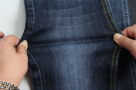 Καλή τιμή 11.8-12 Oz Warp Slub Jeans υφασμάτινο για τον άνδρα Jeans χαμηλή τέντωμα για τον άνδρα Ινδία Στυλ αγοράς της Κίνας εργοστάσιο στο Guangdong σε απευθείας σύνδεση